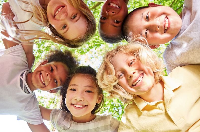 children looking and smiling