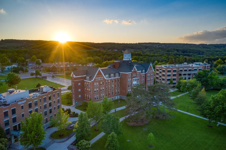 Ariel view of Keuka campus. Brick buildings scattered throughout.